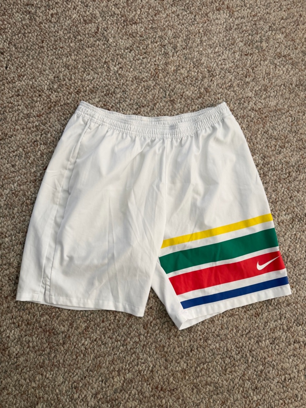 Nike White Shorts with Yellow, Green, Red & Blue Stripe Accent